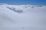 etna volcano snow ski touring clouds