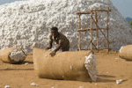 man carrying cotton sack konso omo ethiopia